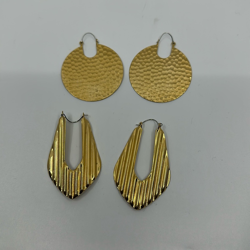 Two pair of huge goldtone statement pierced earrings